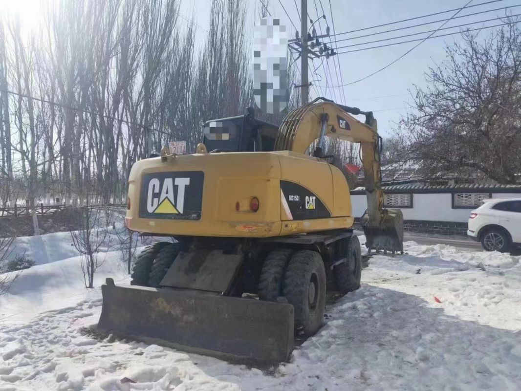 Gotowy do pracy Caterpillar M315D Ekskawator z używanymi kółkami z niskimi godzinami pracy i w dobrym stanie