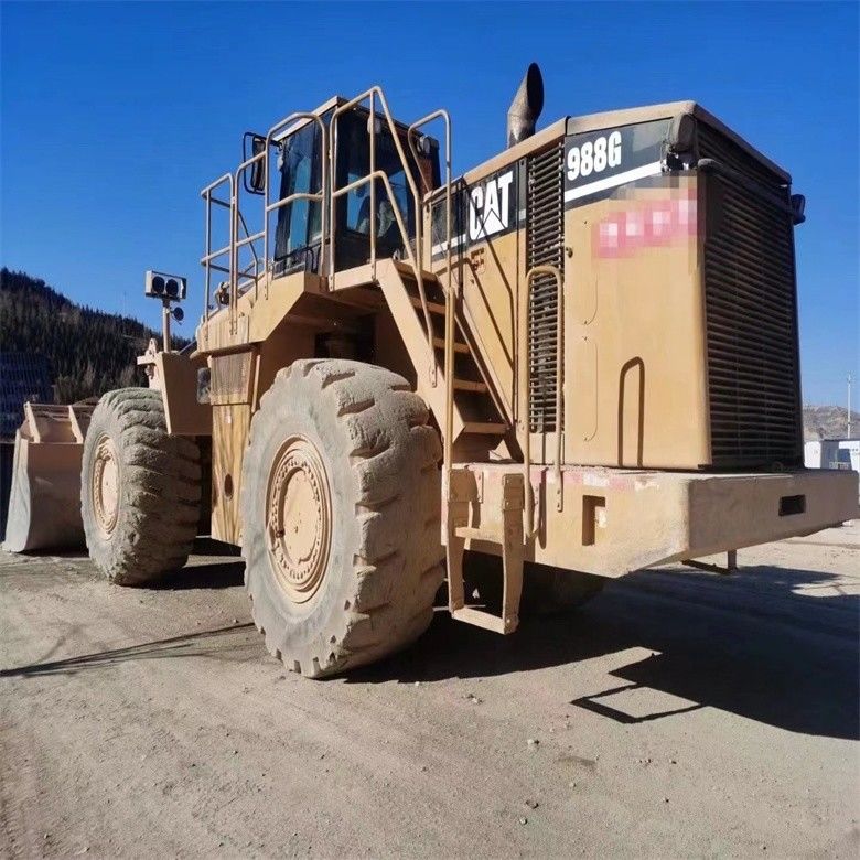 Używany Caterpillar CAT 988G 988 50 Tonkowy Ładowarka Kołowa z Maks. Wysokością Wydalania 4,46m